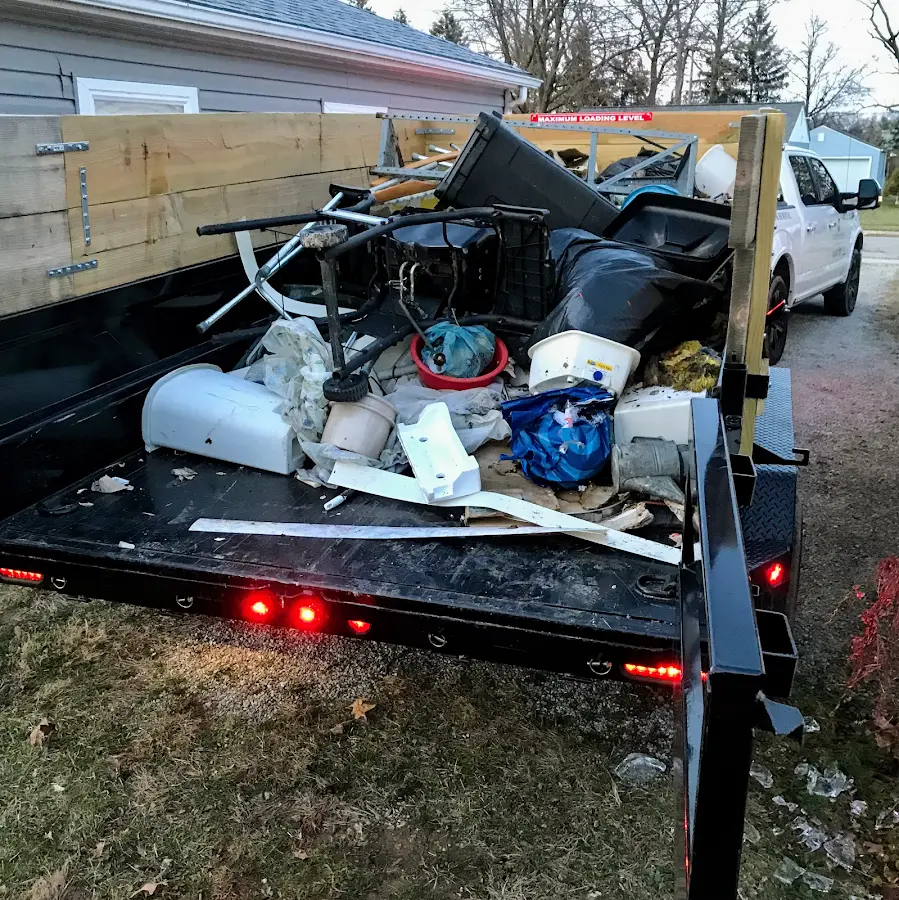 Roll-off dumpster delivered to a residential driveway in Imlay City