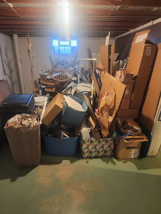 Roll-off dumpster container at job site for Yard Waste Dumpster Rental in Imlay City